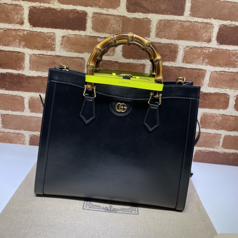G*u*i top handle bags
